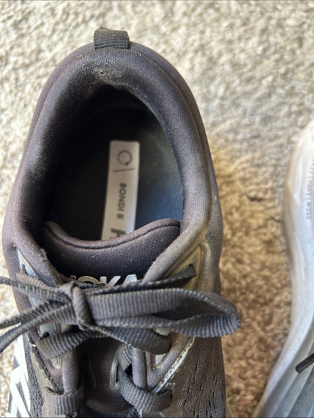 Used women’s Hoka Black Athletic Running Shoes with White Logo - Picture 3 of 11